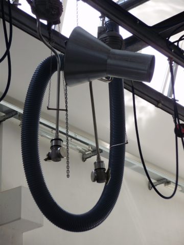 Flexible hose and cone for warm air connection to the tanks